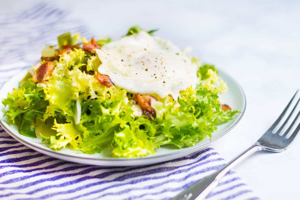 Frisee aux Lardons: Endive salad with bacon, a fried egg, and a light vinaigrette. Recipe via MonPetitFour.com