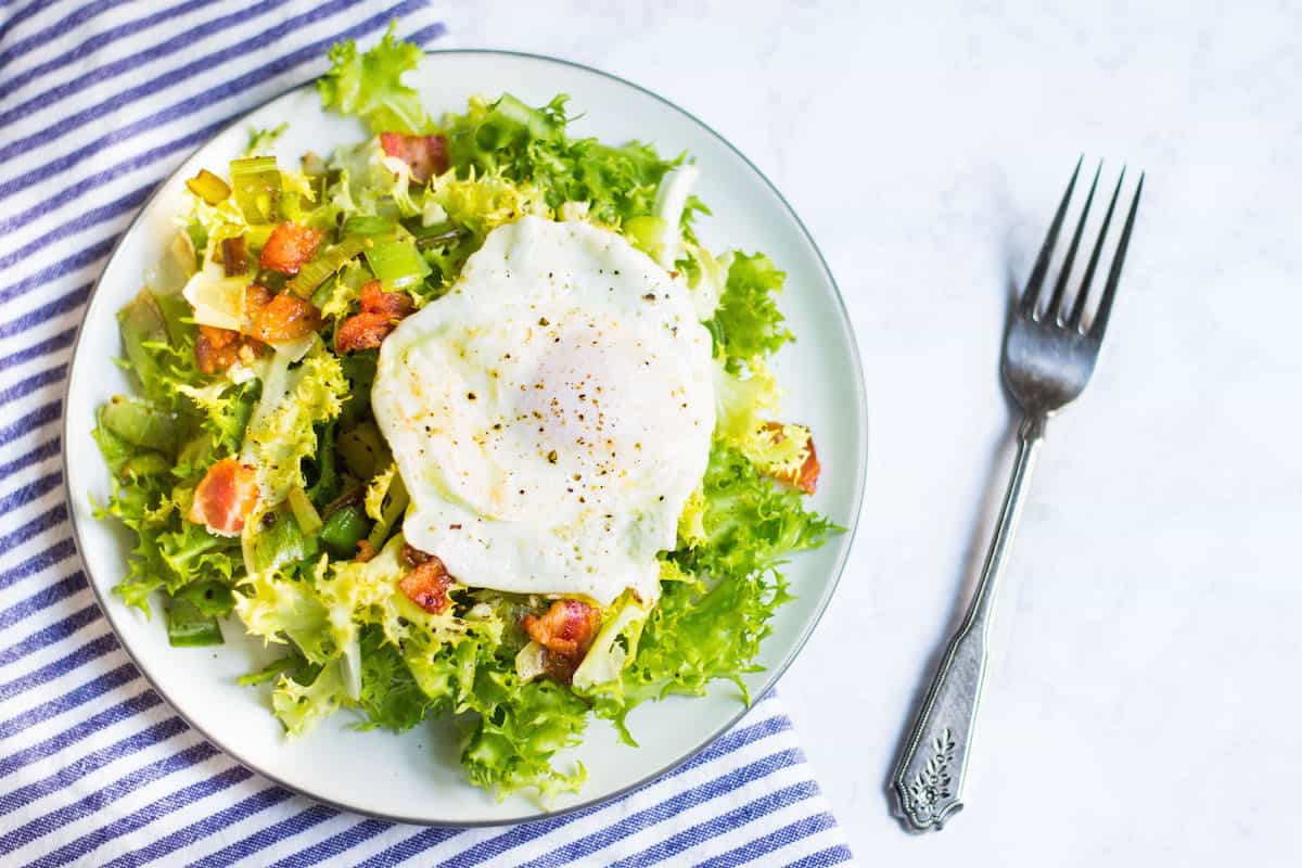 Frisee aux Lardons: Endive salad with bacon, a fried egg, and a light vinaigrette. Recipe via MonPetitFour.com