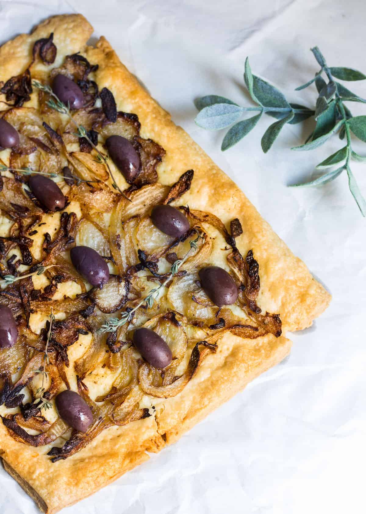 Pissaladière: French-style pizza from Nice made with anchovies, onion, and olives! Recipe via MonPetitFour.com
