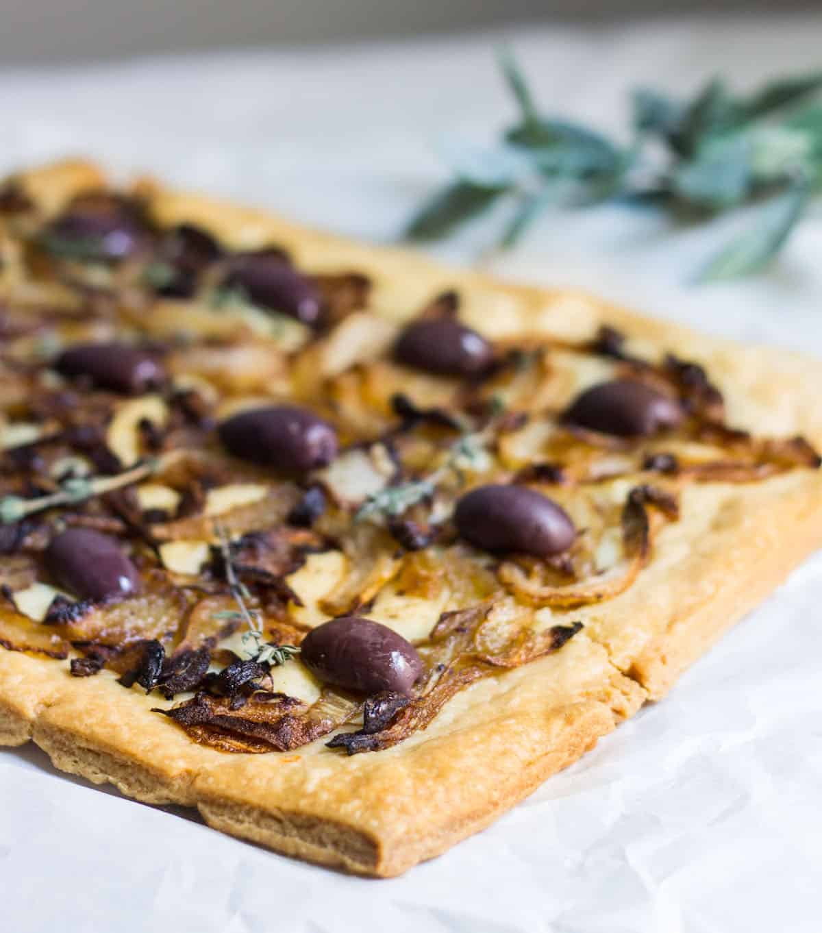 Pissaladière: French-style pizza from Nice made with anchovies, onion, and olives! Recipe via MonPetitFour.com