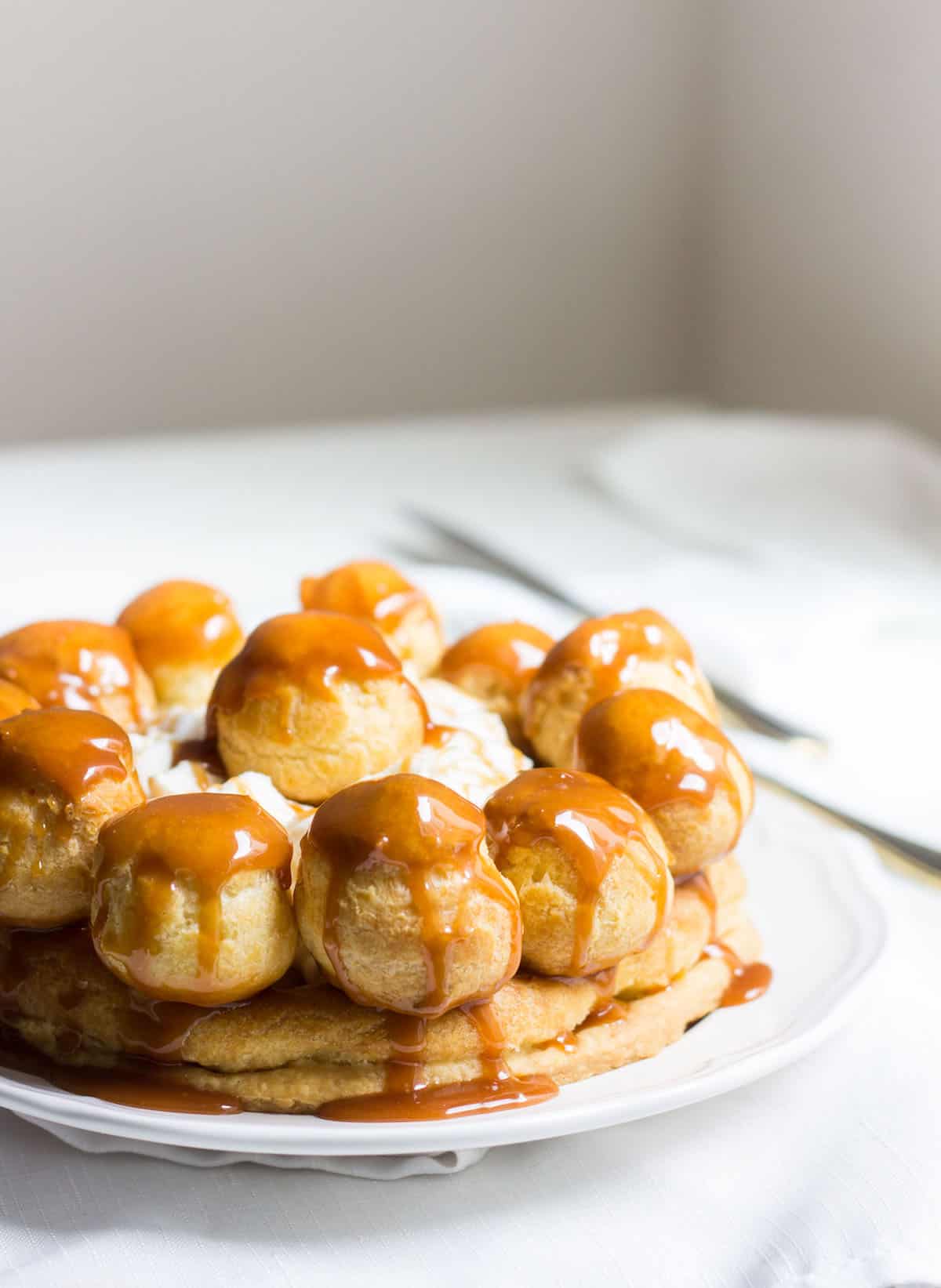 Gateau St. Honore with Salted Caramel! A drool-worthy version made at home, and just a bit easier than the traditional! Recipe via MonPetitFour.com