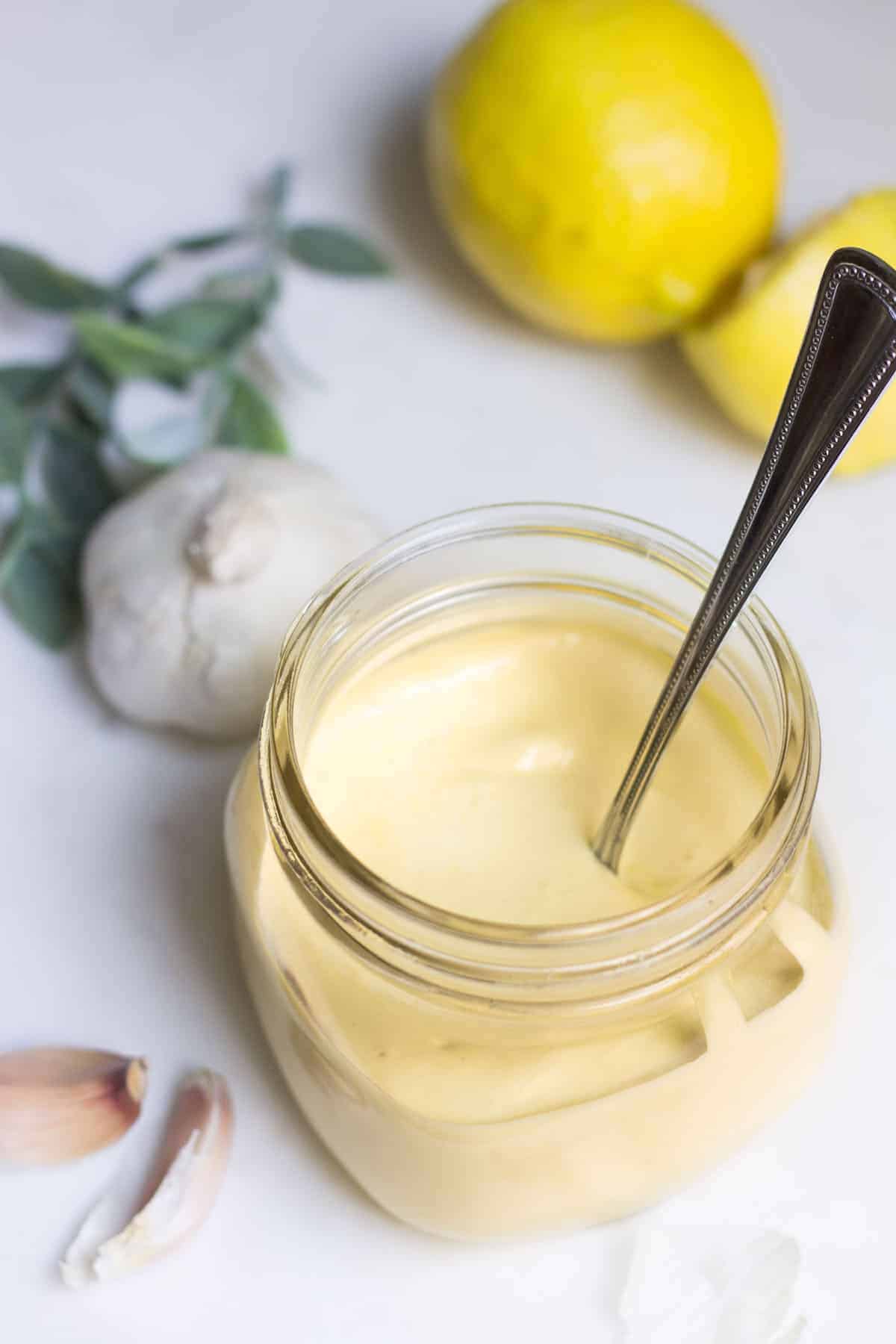 Aioli: a creamy garlic mayonnaise that's perfect on sandwiches, burgers, fries, and more! Recipe via MonpetitFour.com
