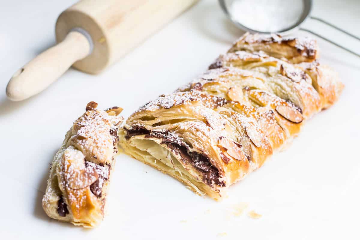 Chocolate Pastry Braid: 3-Ingredient Dessert! Gooey chocolate nestled inside puff pastry and topped with sliced almonds. Recipe via MonPetitFour.com