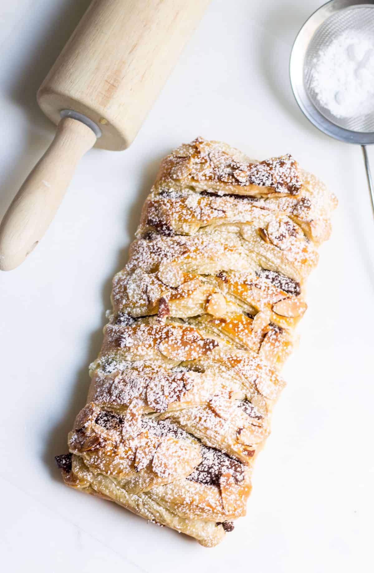Chocolate Pastry Braid: 3-Ingredient Dessert! Gooey chocolate nestled inside puff pastry and topped with sliced almonds. Recipe via MonPetitFour.com