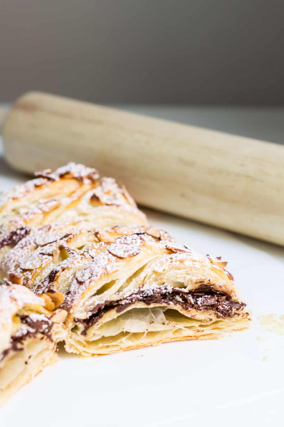 Chocolate Pastry Braid: 3-Ingredient Dessert! Gooey chocolate nestled inside puff pastry and topped with sliced almonds. Recipe via MonPetitFour.com