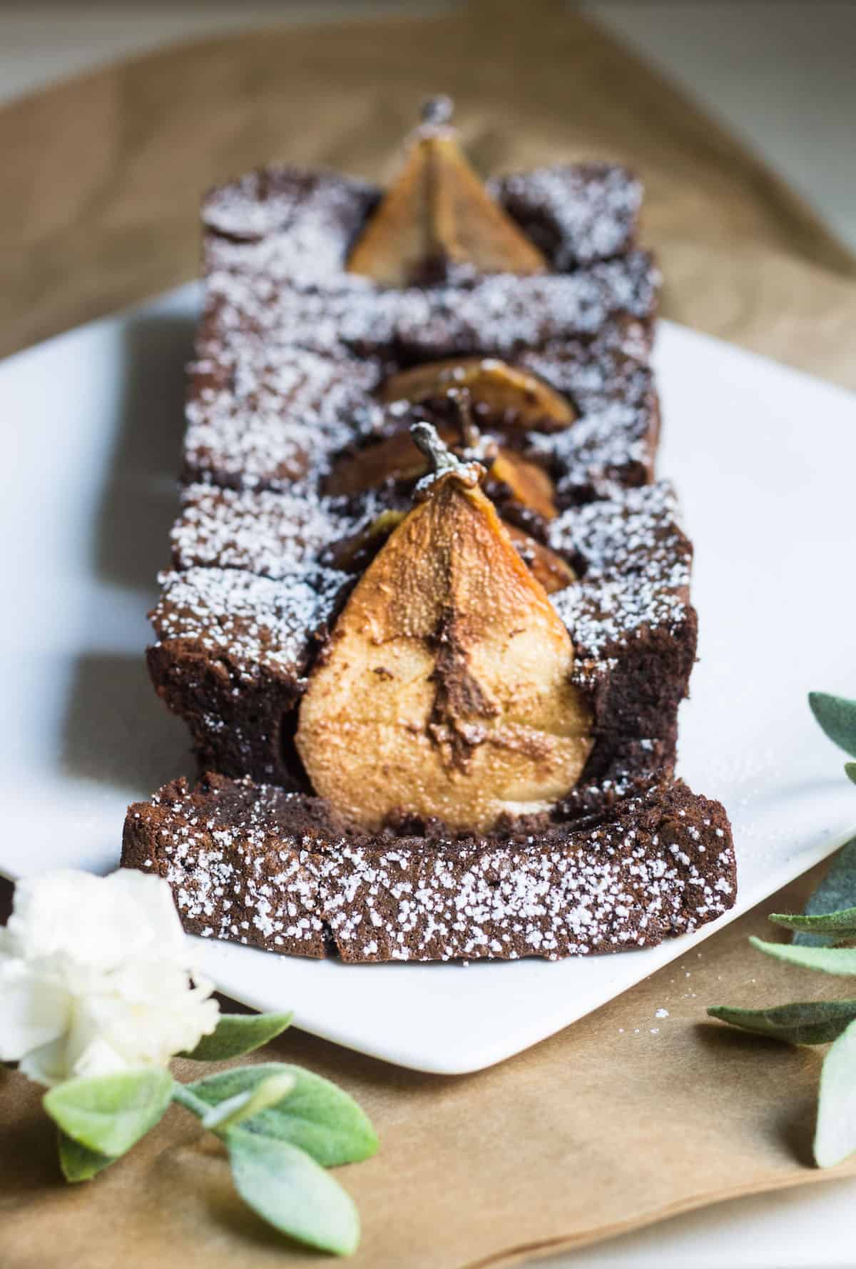 Chocolate Pear Cake: sweet Anjou pears dunked in a rich and fudgy chocolate cake. Recipe via MonPetitFour.com
