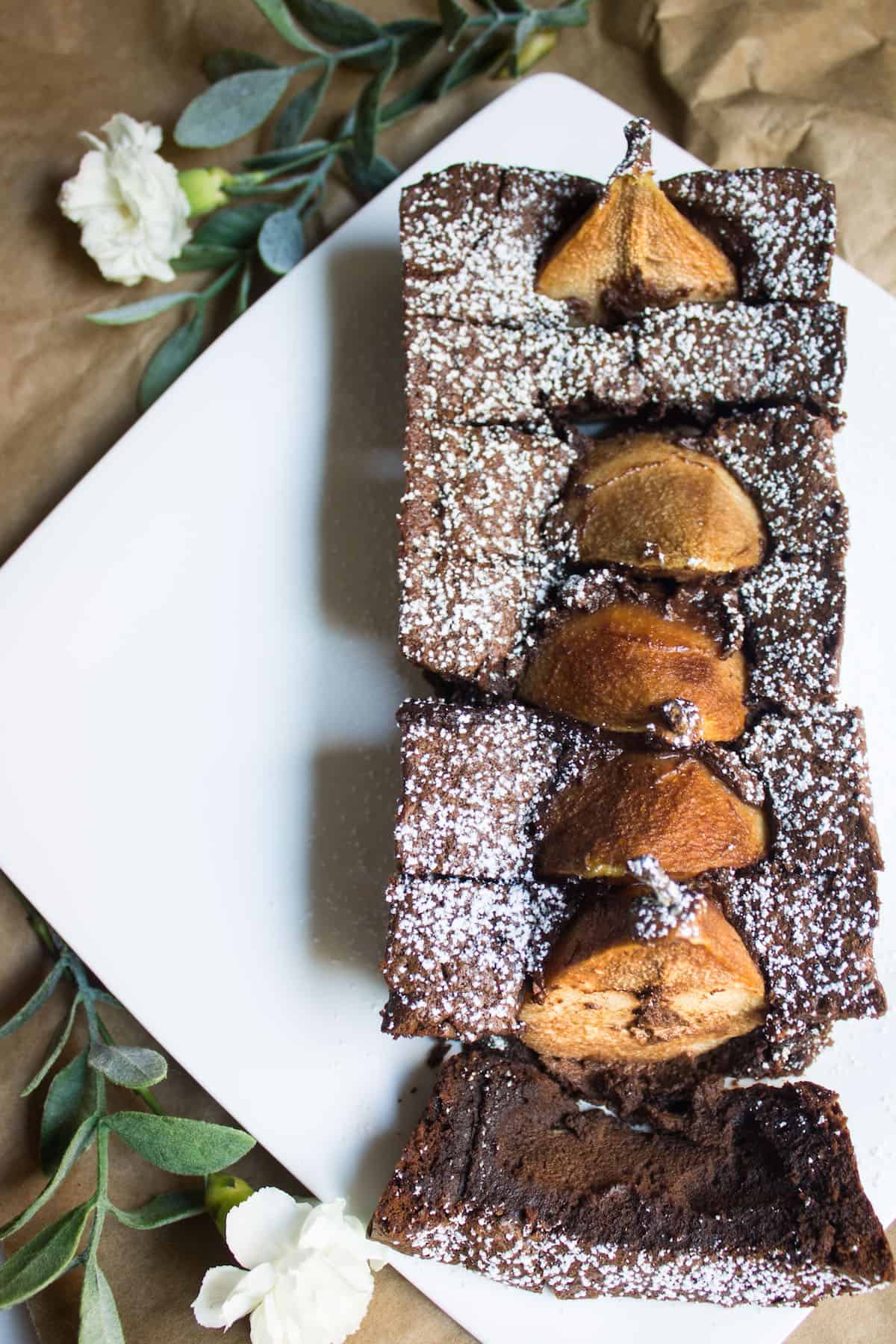 Chocolate Pear Cake: sweet Anjou pears dunked in a rich and fudgy chocolate cake. Recipe via MonPetitFour.com