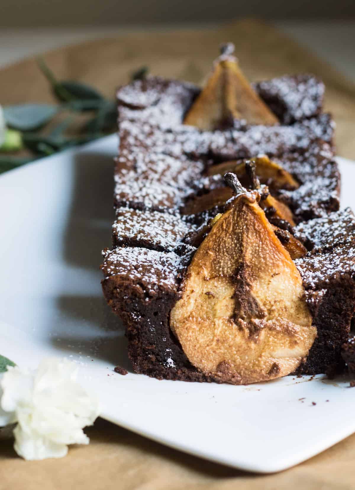 Chocolate Pear Cake: sweet Anjou pears dunked in a rich and fudgy chocolate cake. Recipe via MonPetitFour.com