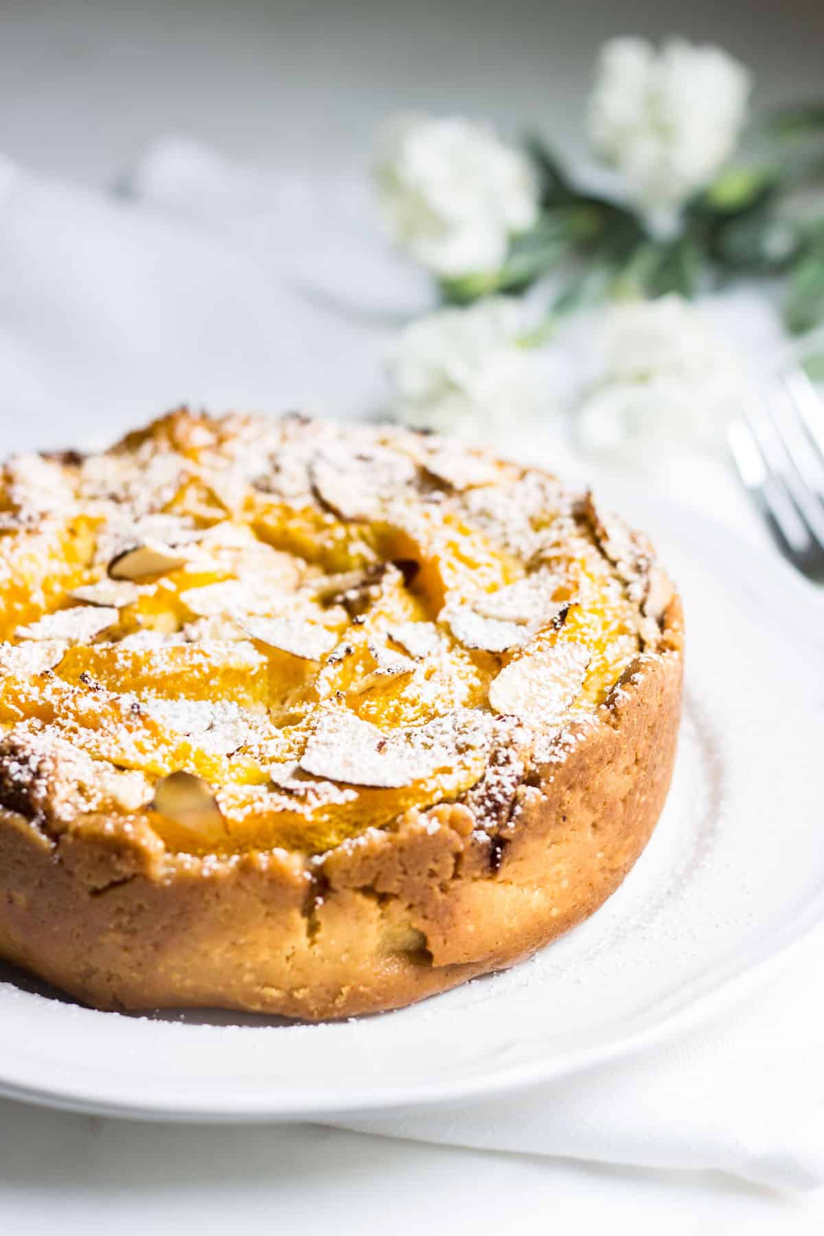 Frangipane Tart with Oranges: a sweet, almond cream tart with delicious orange wedges. Recipe via MonPetitFour.com