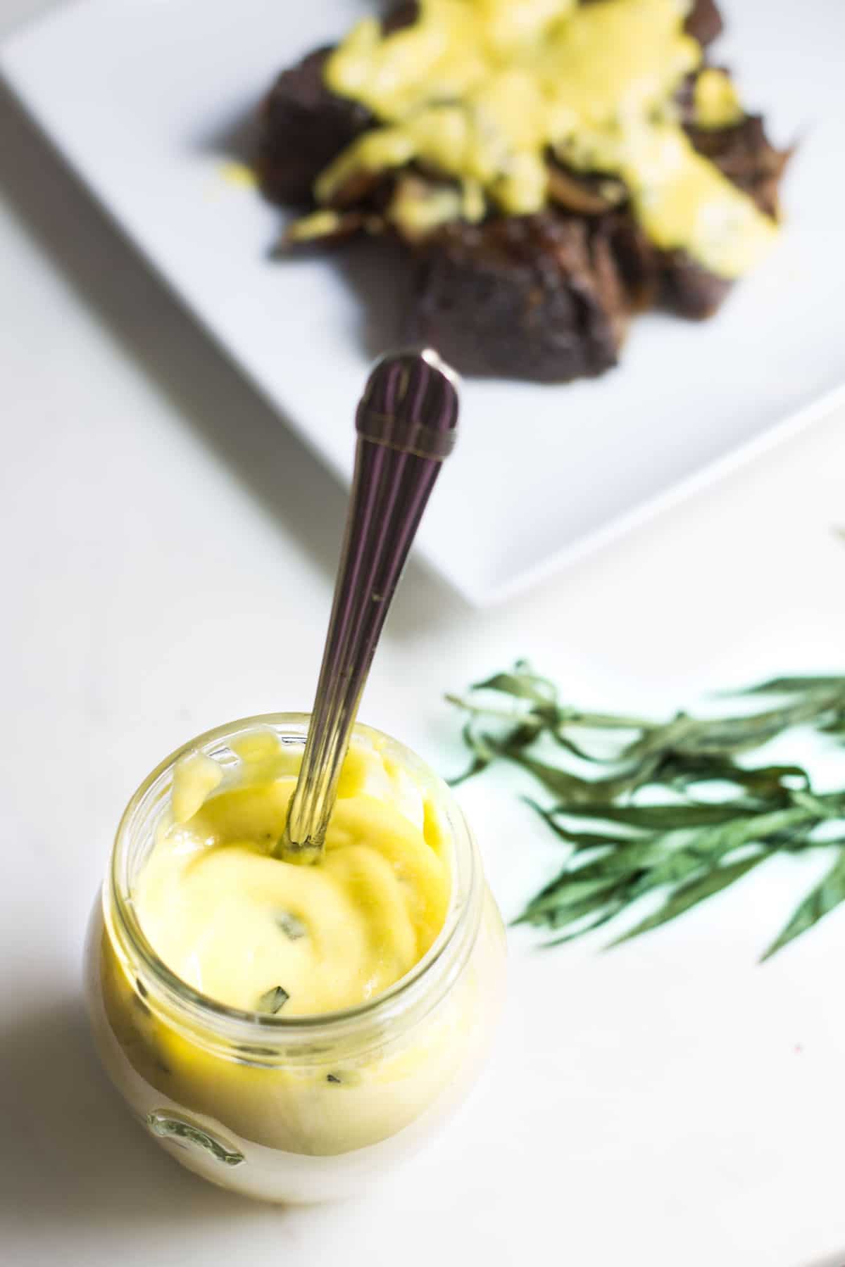 Béarnaise Sauce: a creamy, tarragon-flavored French sauce that's a dream over meat, poultry, and fish! Recipe via MonPetitFour.com