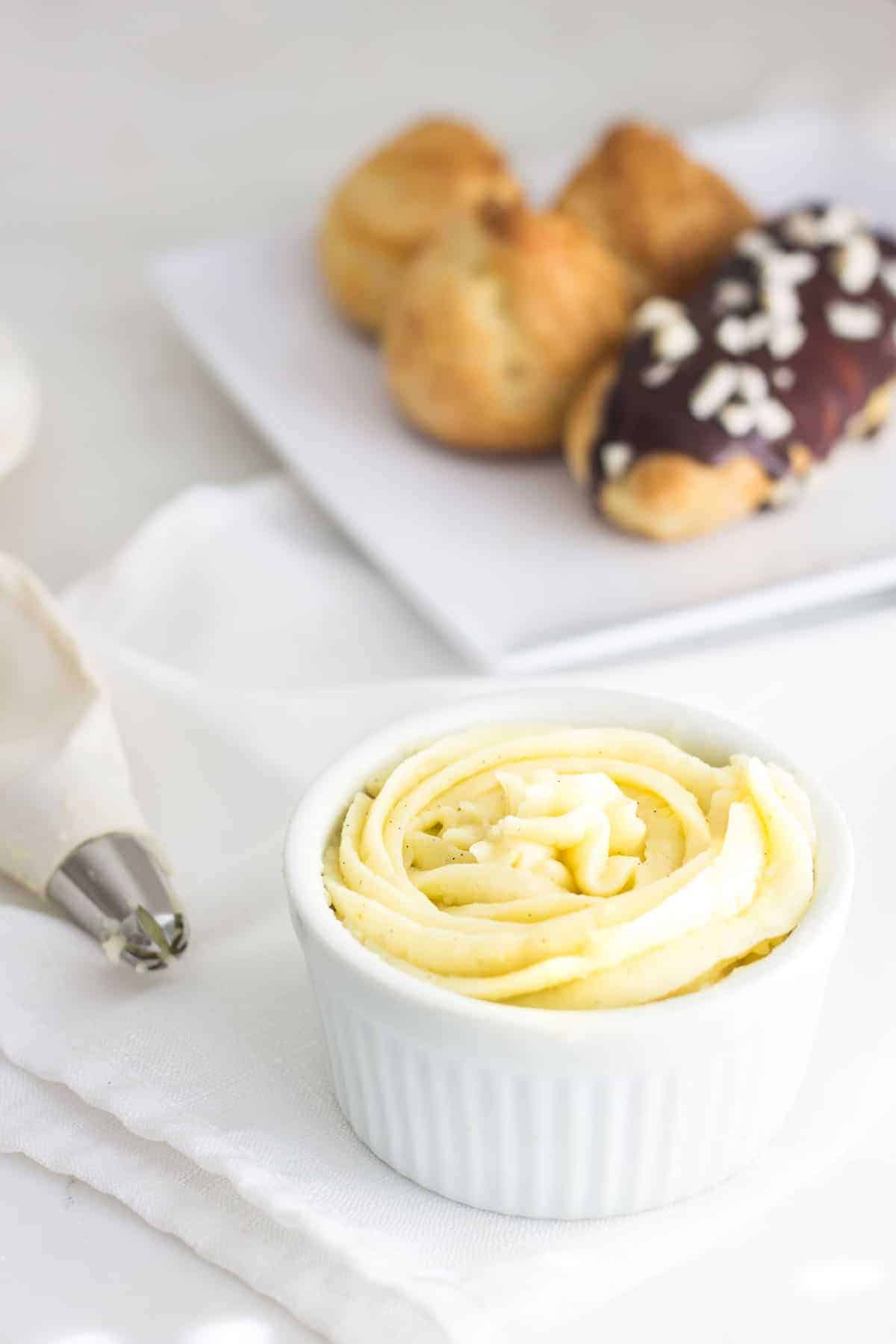 Pastry Cream (Creme Patissiere): a simple and creamy filling for tarts, cakes, and French pastries like eclairs and profiteroles! Recipe via MonPetitFour.com
