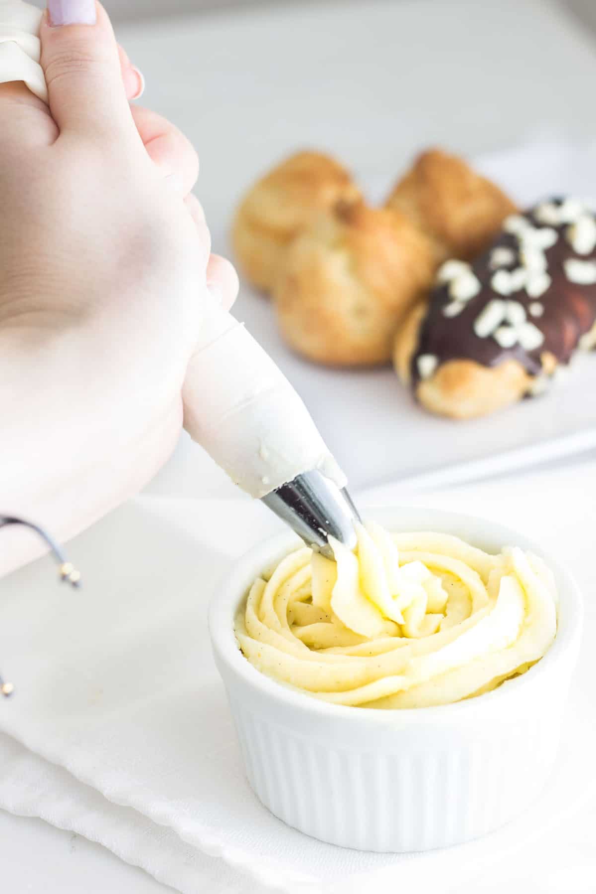 Pastry Cream (Creme Patissiere): a simple and creamy filling for tarts, cakes, and French pastries like eclairs and profiteroles! Recipe via MonPetitFour.com