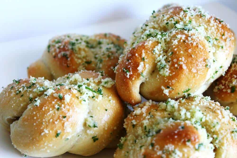 garlic knots stacked on top of each other