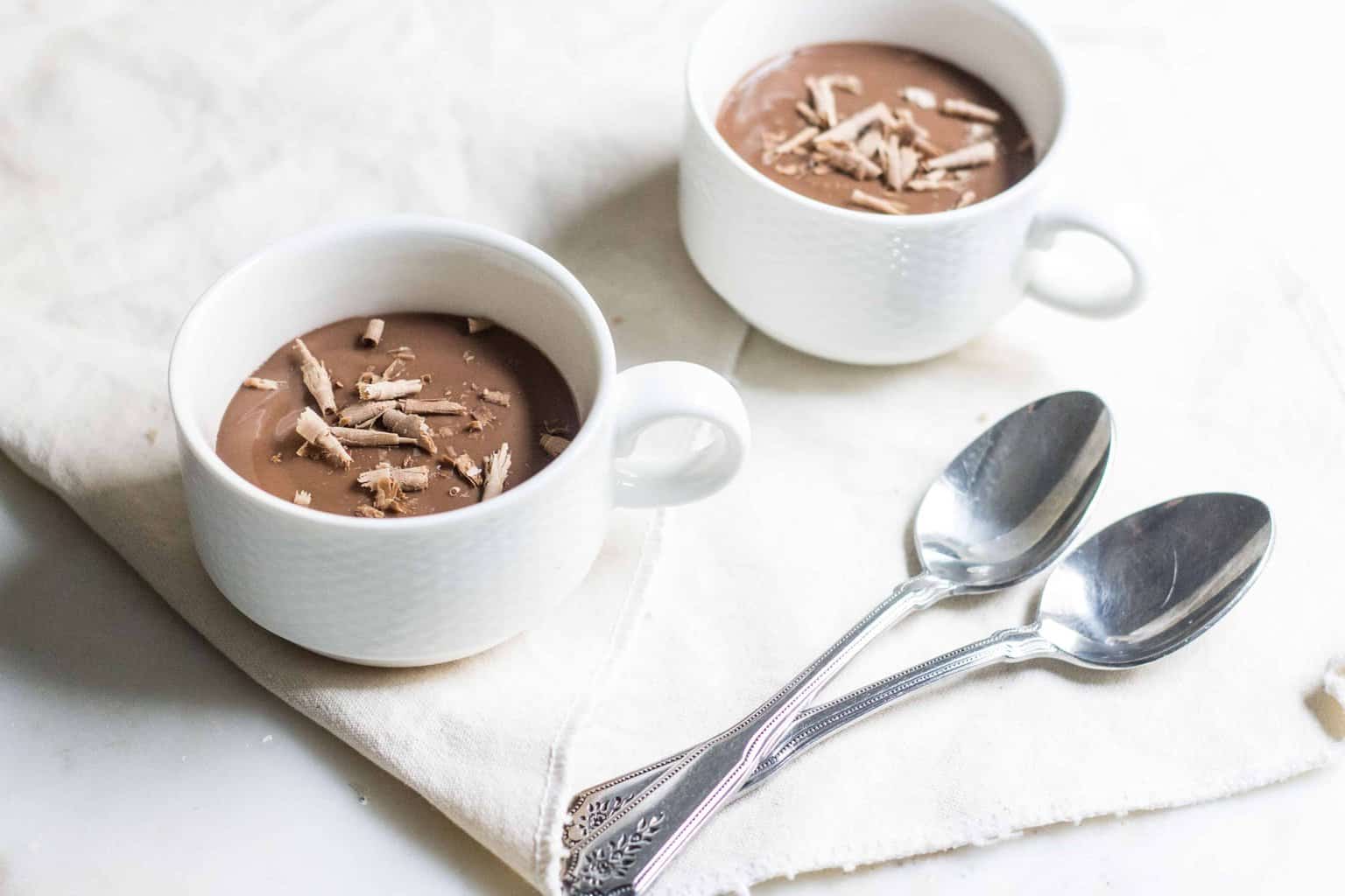 Chocolate Pudding (creme au chocolat): quick and easy, no-bake silky, rich pudding. Made without eggs. French dessert recipe via MonPetitFour.com