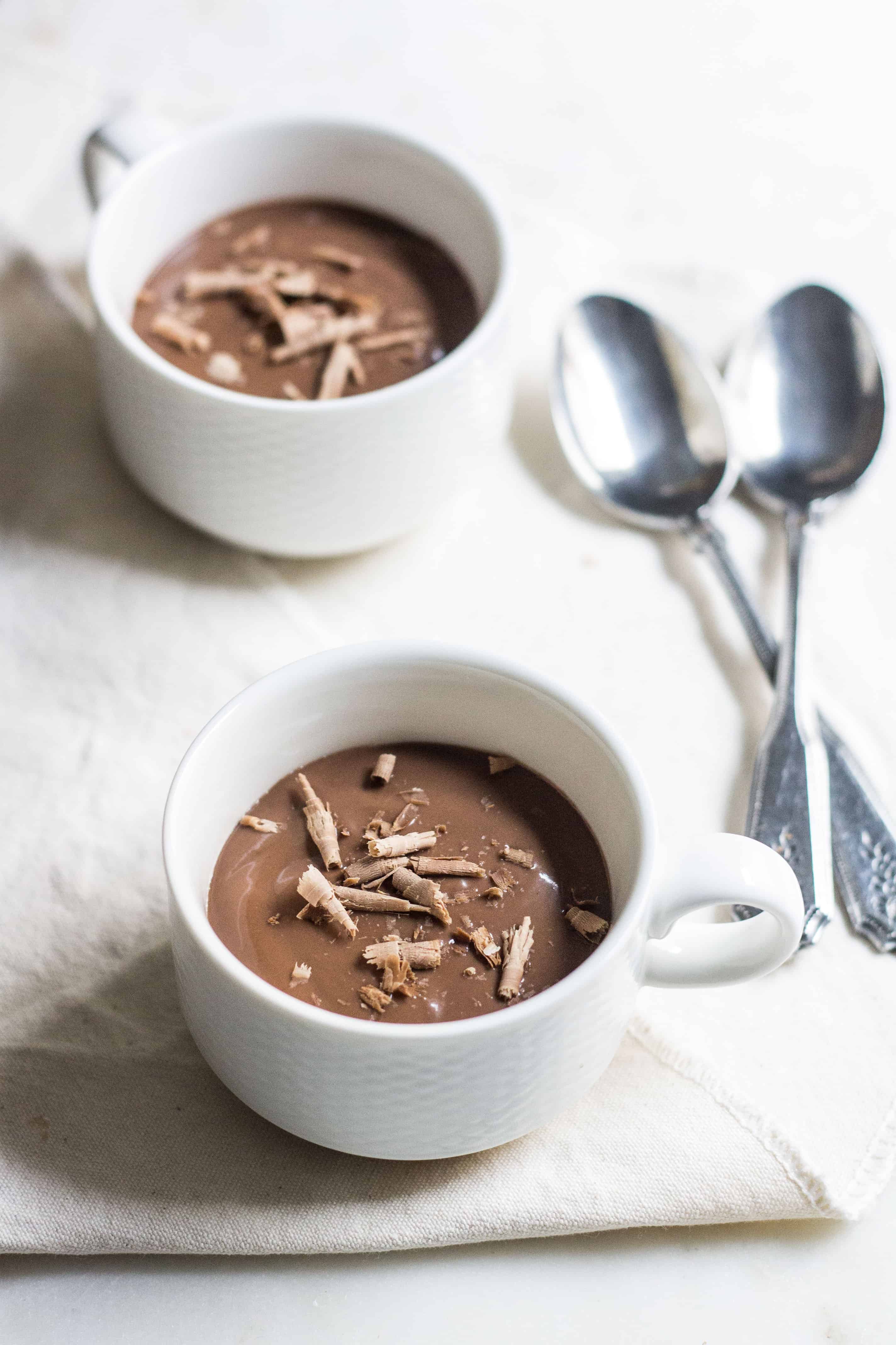 Chocolate Pudding (creme au chocolat): quick and easy, no-bake silky, rich pudding. Made without eggs. French dessert recipe via MonPetitFour.com