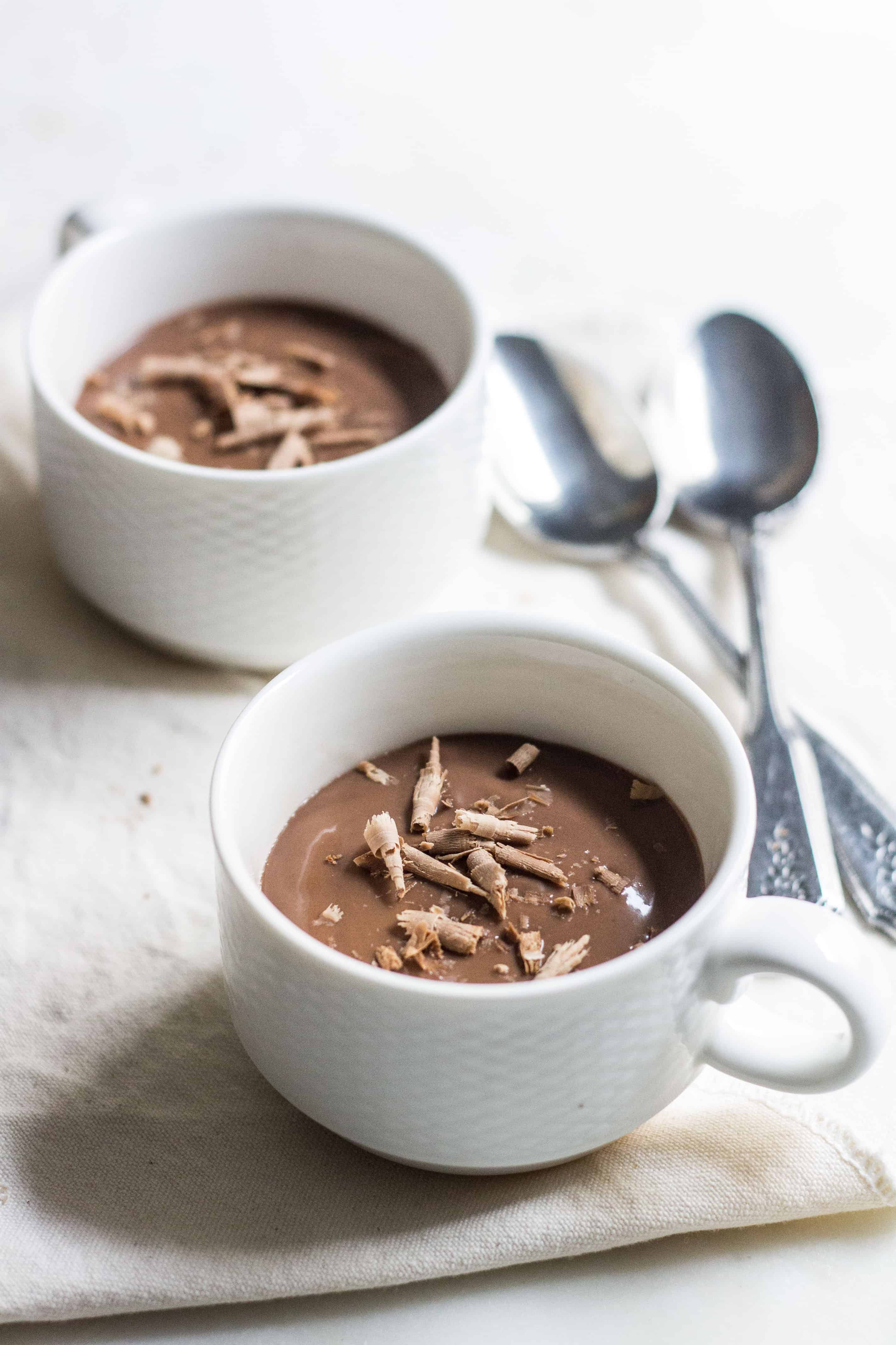 Chocolate Pudding (creme au chocolat): quick and easy, no-bake silky, rich pudding. Made without eggs. French dessert recipe via MonPetitFour.com