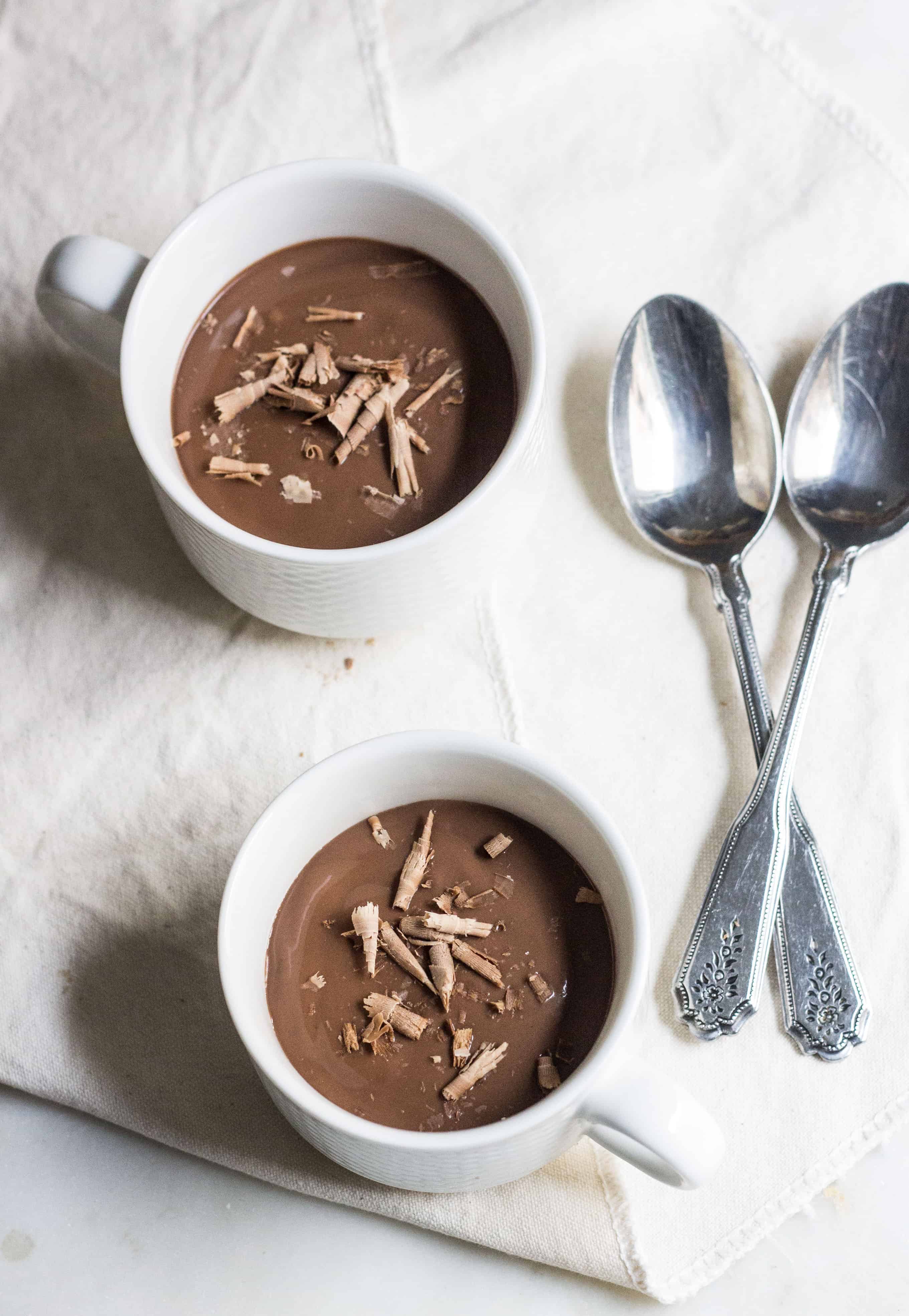 Chocolate Pudding (creme au chocolat): quick and easy, no-bake silky, rich pudding. Made without eggs. French dessert recipe via MonPetitFour.com
