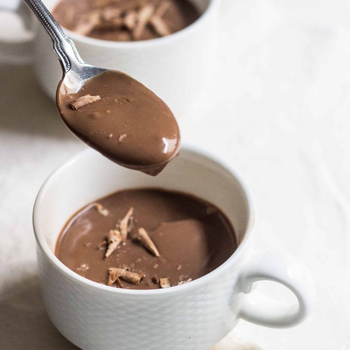 Chocolate Pudding (creme au chocolat): quick and easy, no-bake silky, rich pudding. Made without eggs. French dessert recipe via MonPetitFour.com
