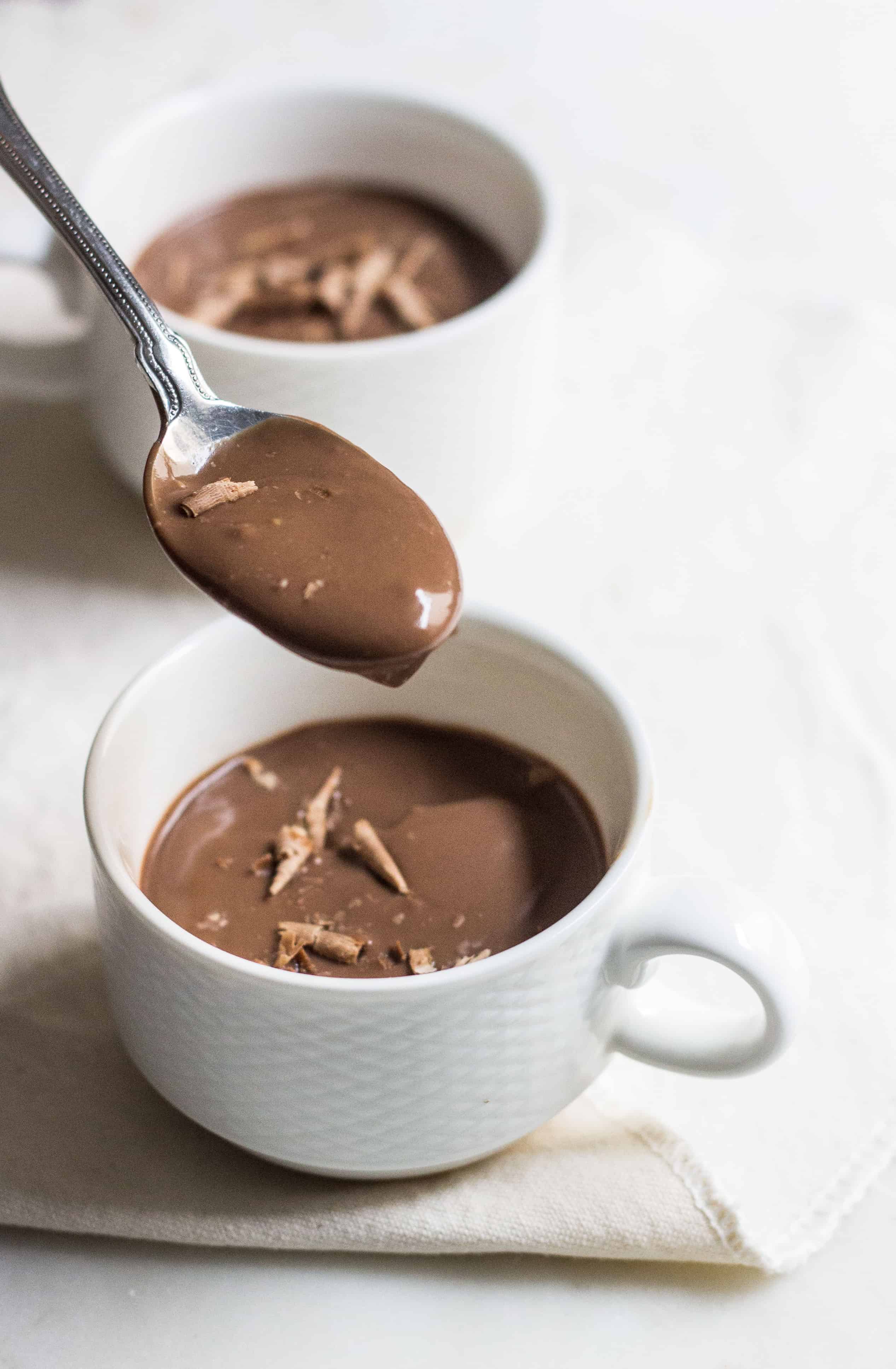 Chocolate Pudding (creme au chocolat): quick and easy, no-bake silky, rich pudding. Made without eggs. French dessert recipe via MonPetitFour.com