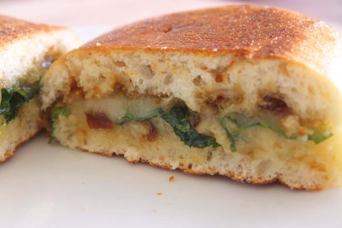 Grilled Brie Cheese close up shot of sandwich half