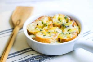 French Onion Soup: a classic & easy bistro soup made with caramelized onions, beef broth, French bread, and melted cheese. Recipe via MonPetitFour.com