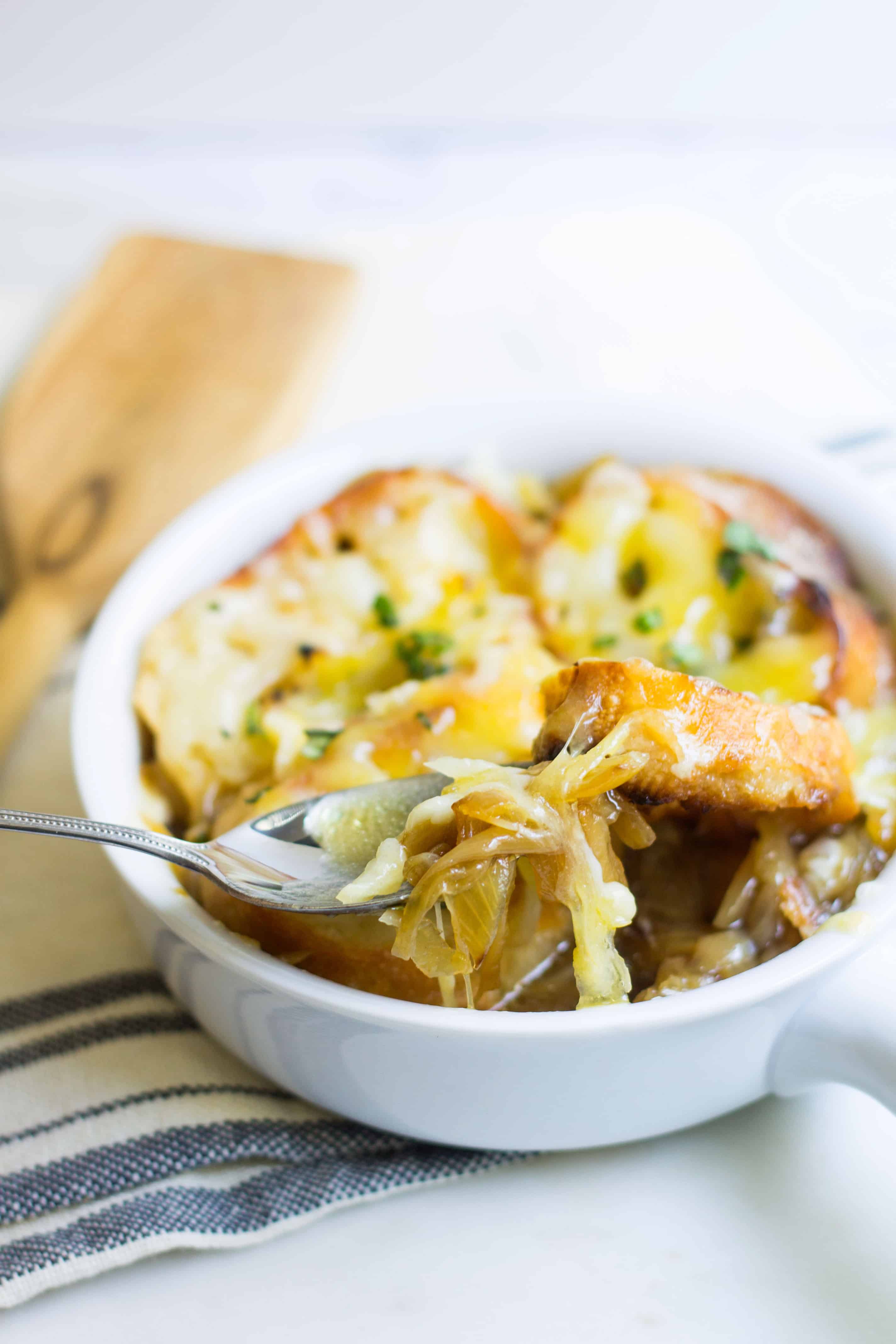Spoonful of French onion soup without wine