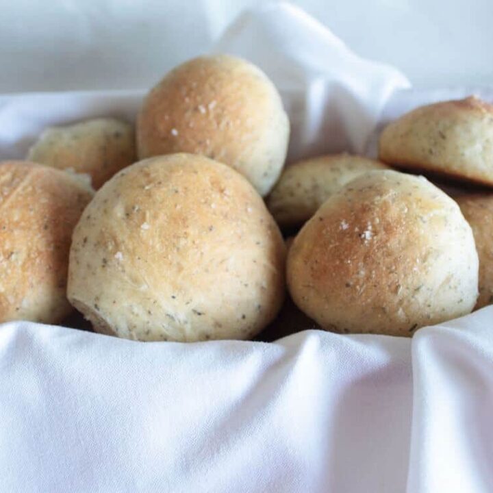 herbed dinner rolls recipe in a basket image