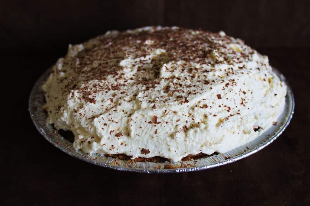 French Silk Pie Recipe with whipped cream and graham cracker crust