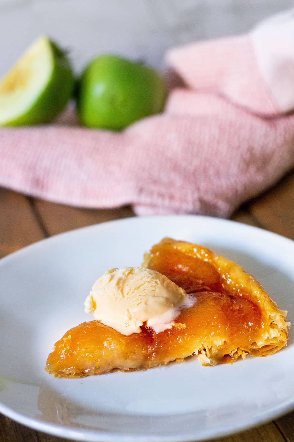apple tarte tatin slice with ice cream on top