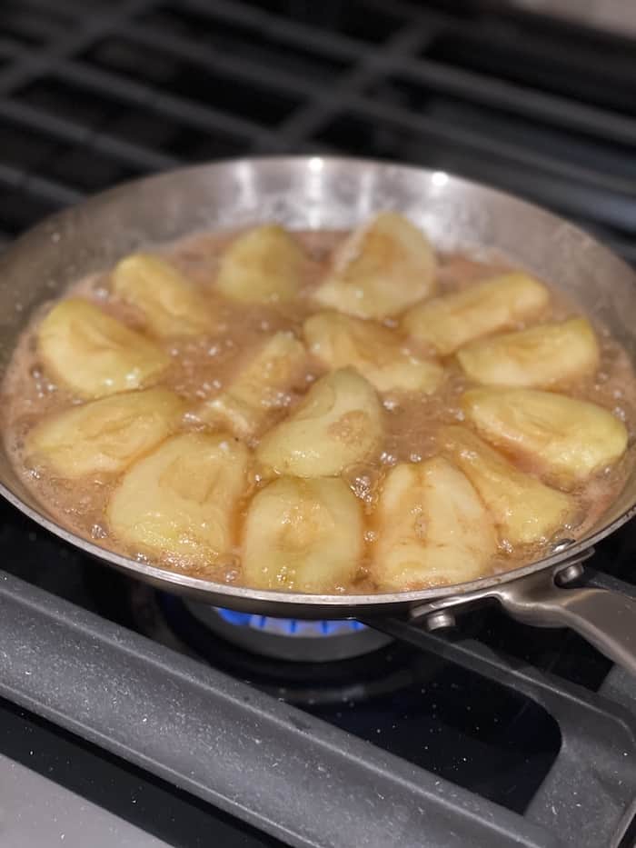 apples arranged in radial pattern in caramel