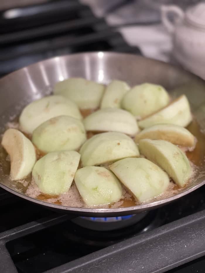 apples added to hot caramel