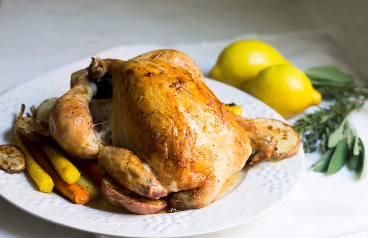 Poulet Roti: Roast chicken done the French way. A recipe for juicy, crisp chicken that'll taste and look fantastic. Recipe via MonPetitFour.com