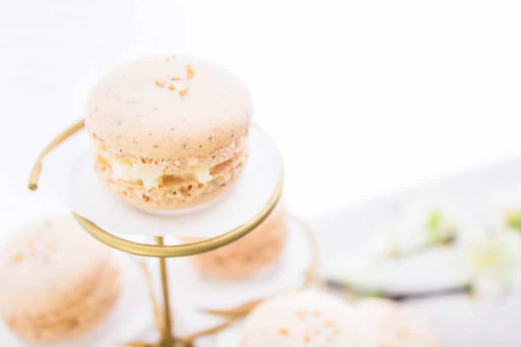 close-up shot of French macarons with apricot filling