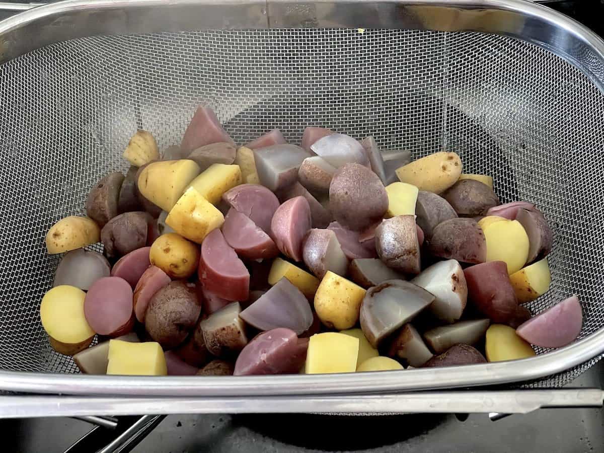 potatoes in a sieve image