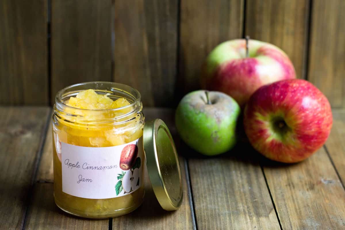 Apple Jam Recipe in a jar next to apples