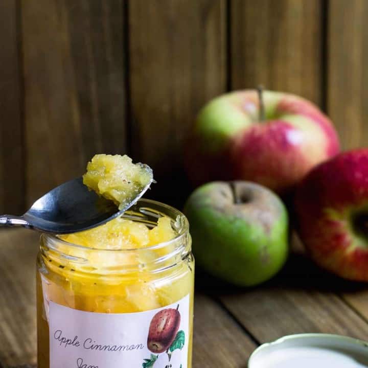 Apple Jam Recipe being scooped up out of a jar