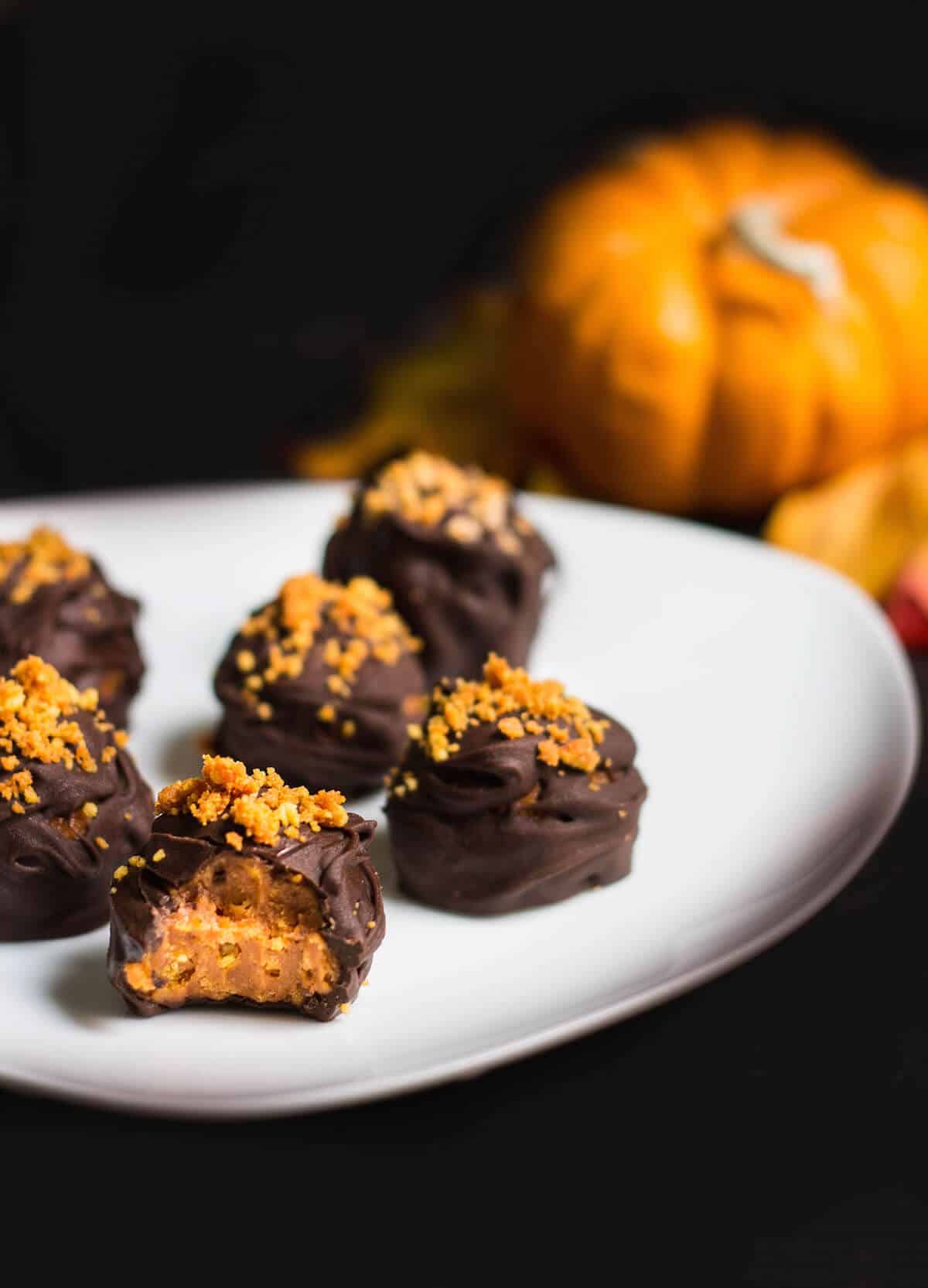 Oreo Truffles made with pumpkin spice oreos - close up shot of inside truffle