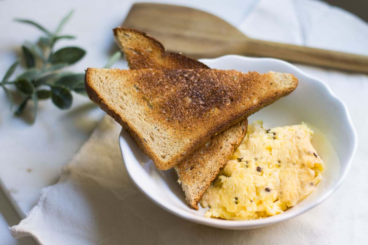 Scrambled Eggs with Truffle. French-style eggs with delicious truffle paste! Recipe via MonPetitFour.com