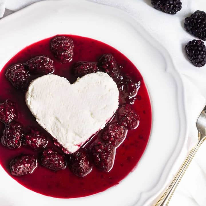 Coeur a la creme: A creamy, rich French dessert served with blackberry sauce. Perfect for Valentine's Day or special occasions! Recipe via MonPetitFour.com