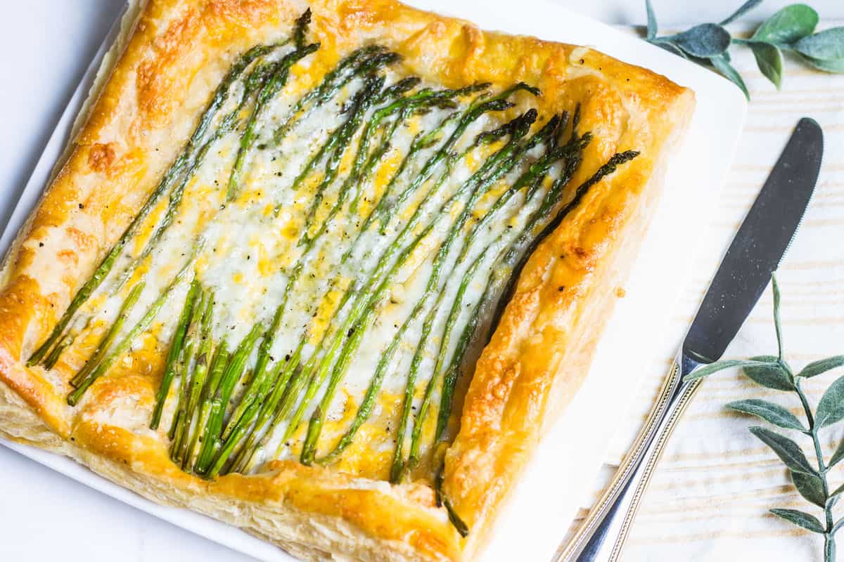 Asparagus Tart: a quick and simple appetizer or lunch using puff pastry, fresh asparagus, and cheese. Recipe via MonPetitFour.com
