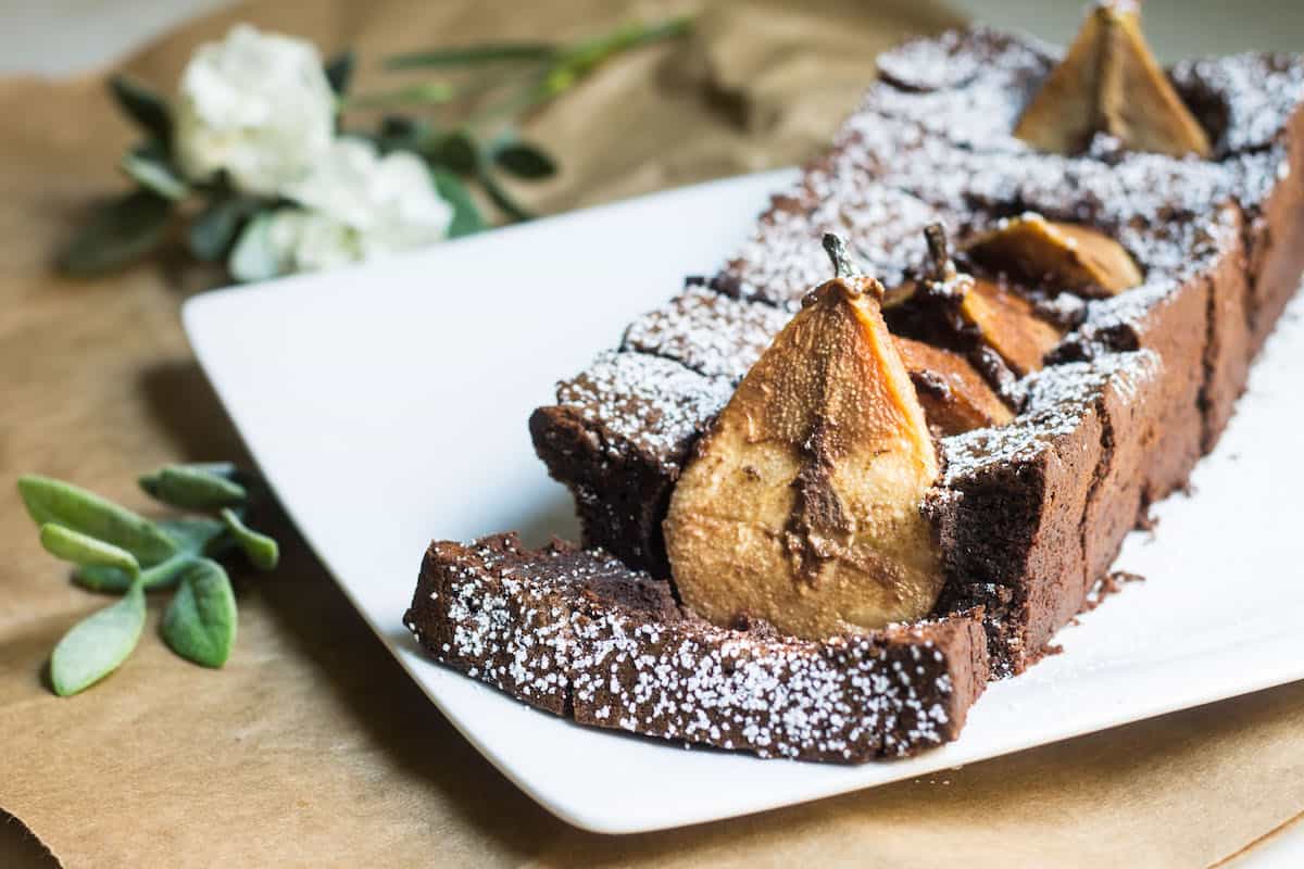 Chocolate Pear Cake: sweet Anjou pears dunked in a rich and fudgy chocolate cake. Recipe via MonPetitFour.com