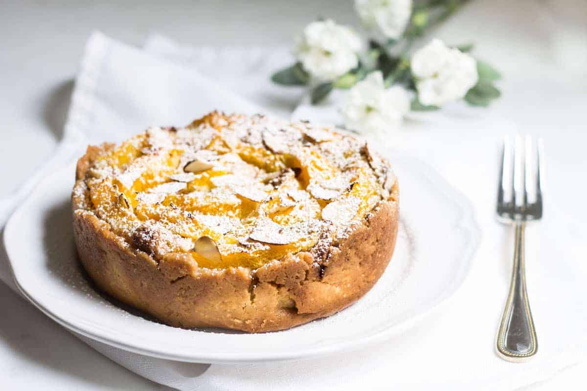 Frangipane Tart with Oranges: a sweet, almond cream tart with delicious orange wedges. Recipe via MonPetitFour.com