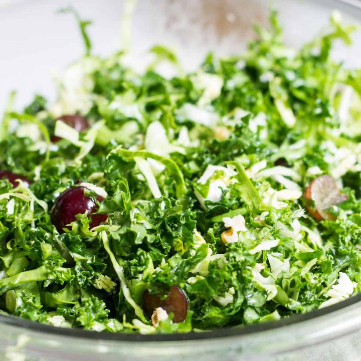 Kale Brussels Sprout Salad: A delicious & healthy, go-to salad to enjoy on its own or with your favorite entrée! Recipe via MonPetitFour.com