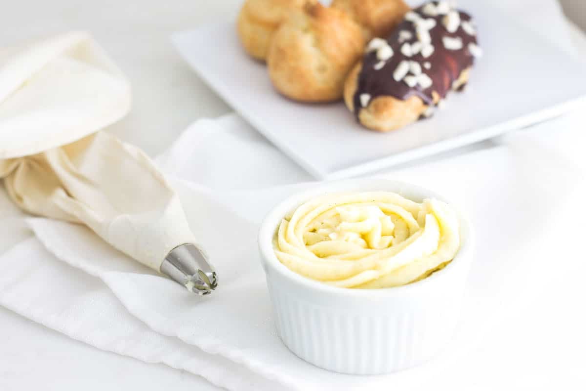 Pastry Cream (Creme Patissiere): a simple and creamy filling for tarts, cakes, and French pastries like eclairs and profiteroles! Recipe via MonPetitFour.com