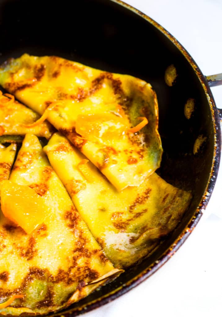 Crepes Suzette with flambe orange sauce