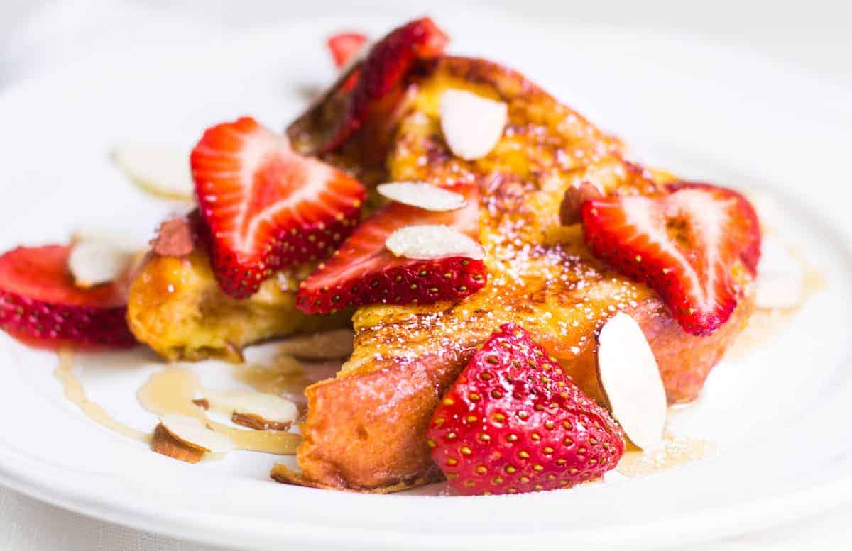 Pain Perdu: French toast made with brioche and fresh strawberries. Recipe via MonPetitFour.com