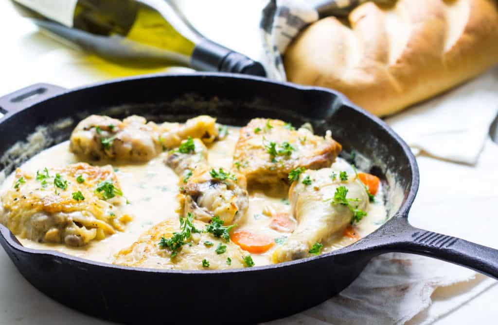 Chicken in White Wine Sauce aka Coq au Vin Blanc. Chicken cooked in a creamy white wine sauce. A one-pan dinner recipe via MonPetitFour.com