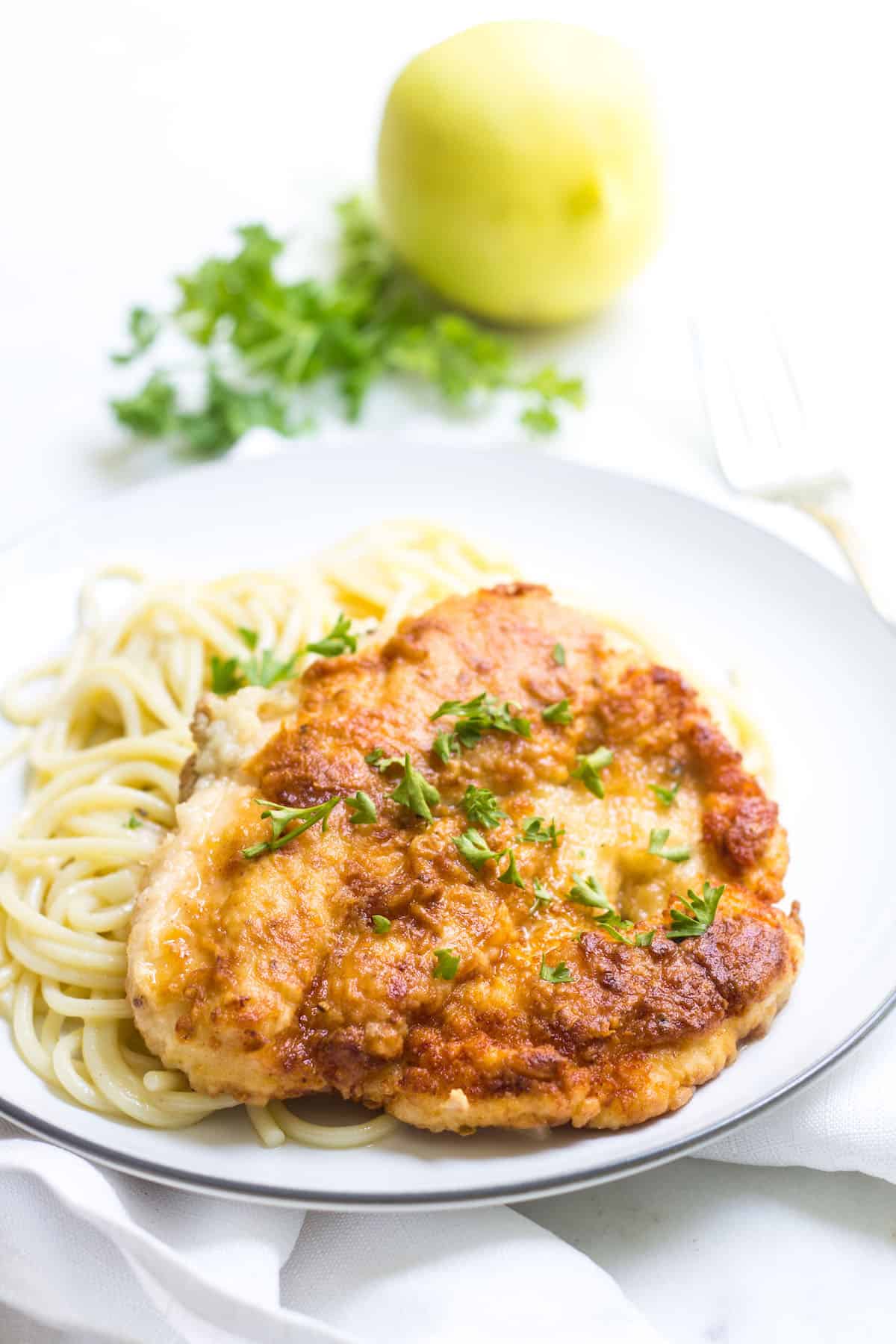 Chicken Meunière: chicken dredged in flour and fried, then topped with a lemon butter sauce. French Recipe via MonPetitFour.com