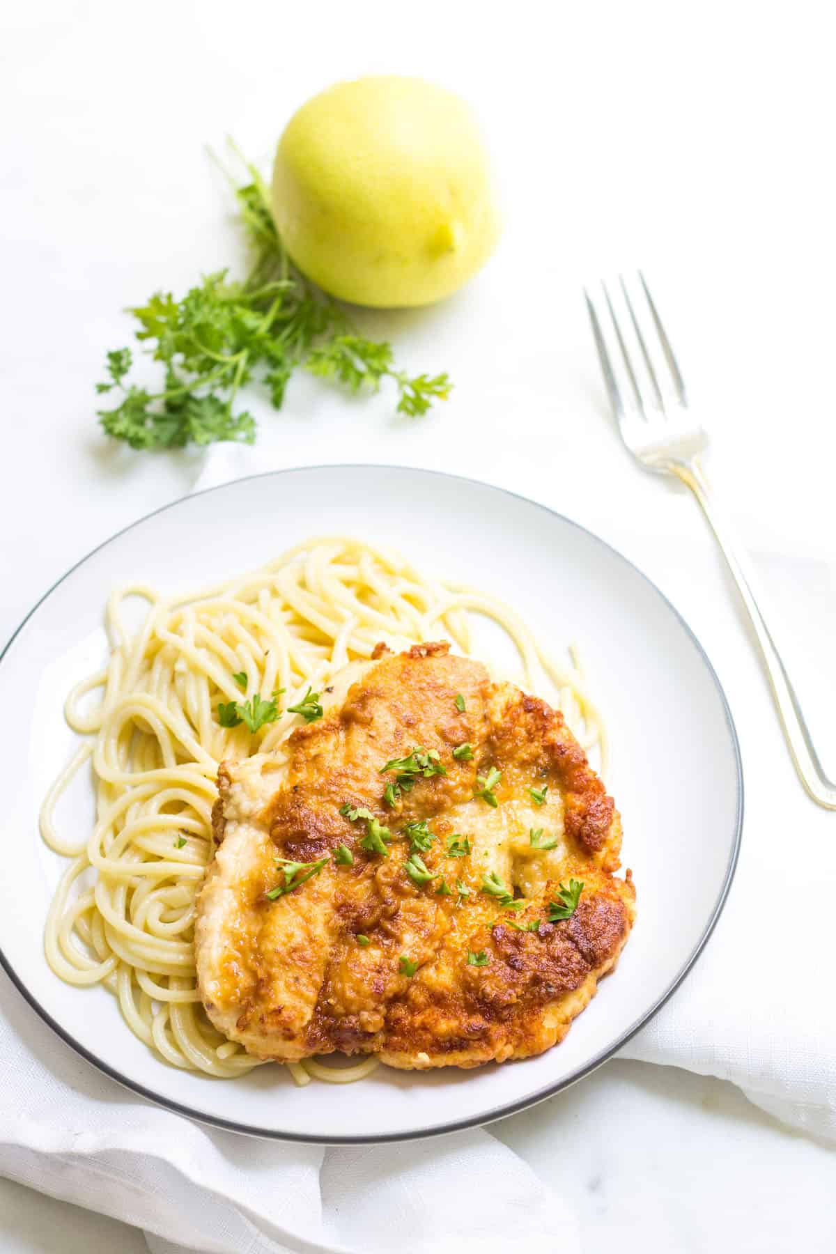 Chicken Meunière: chicken dredged in flour and fried, then topped with a lemon butter sauce. French Recipe via MonPetitFour.com