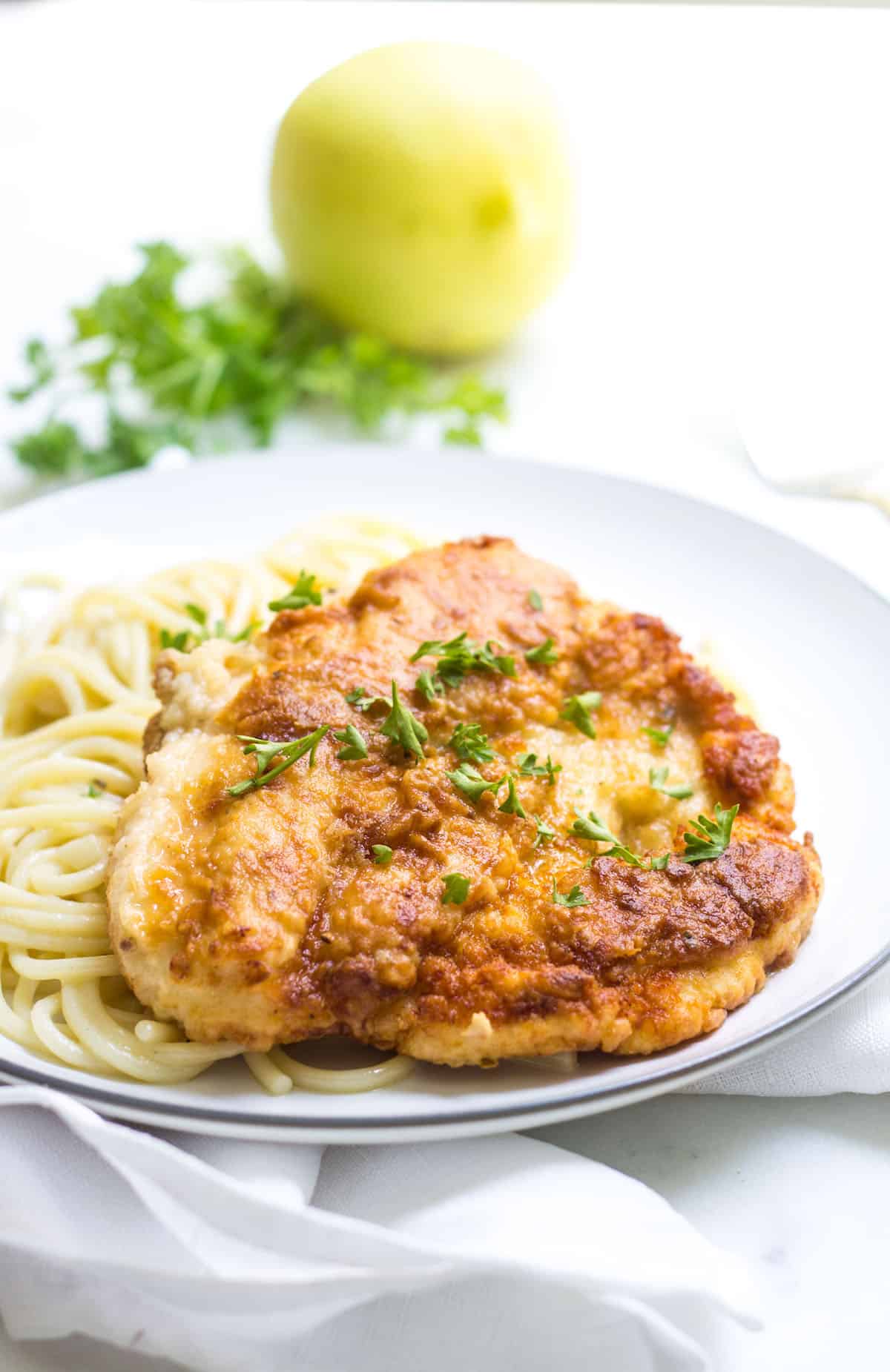 Chicken Meunière: chicken dredged in flour and fried, then topped with a lemon butter sauce. French Recipe via MonPetitFour.com